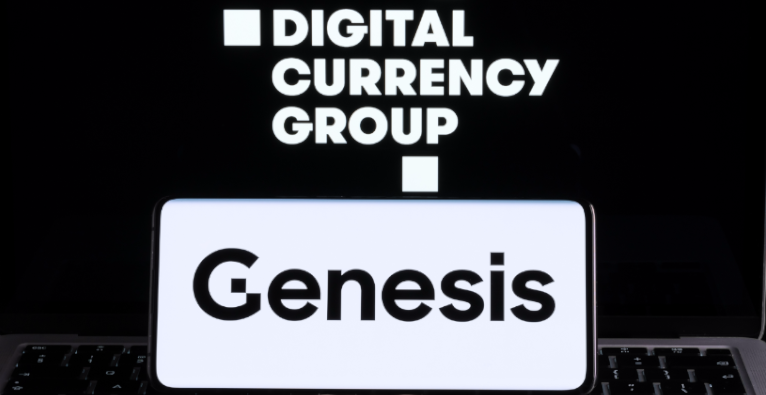 The logos of Digital Currency Group and its subsidiary Genesis on screens